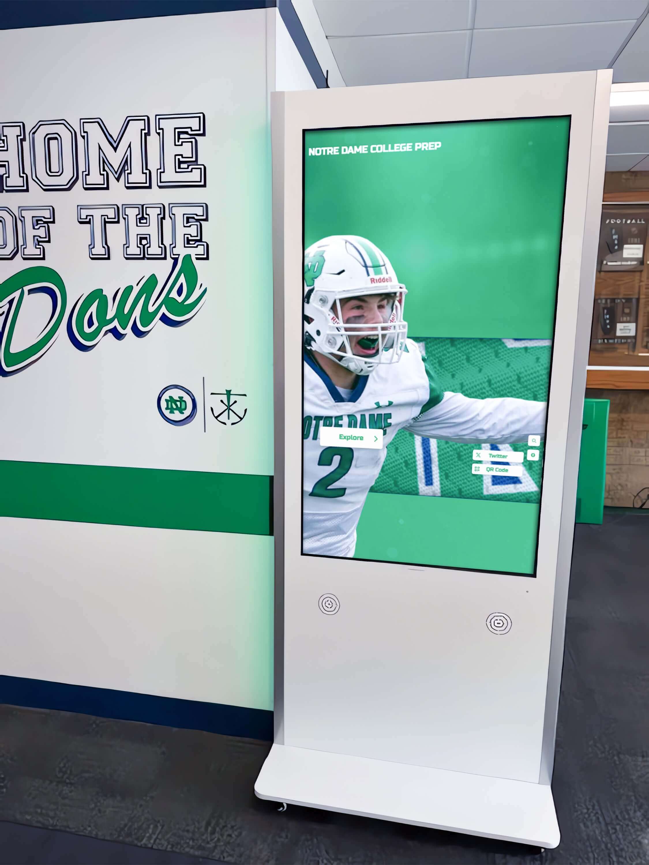 Interactive hall of fame kiosk in school hallway displaying football achievements Hall of fame interactive kiosk