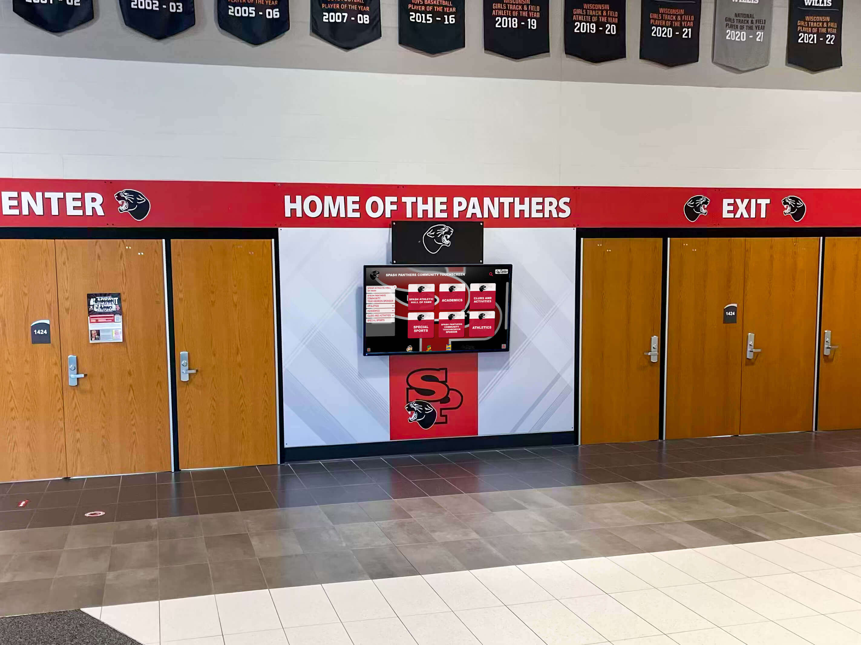 School hall of fame lobby entrance digital screen by the Panthers doors