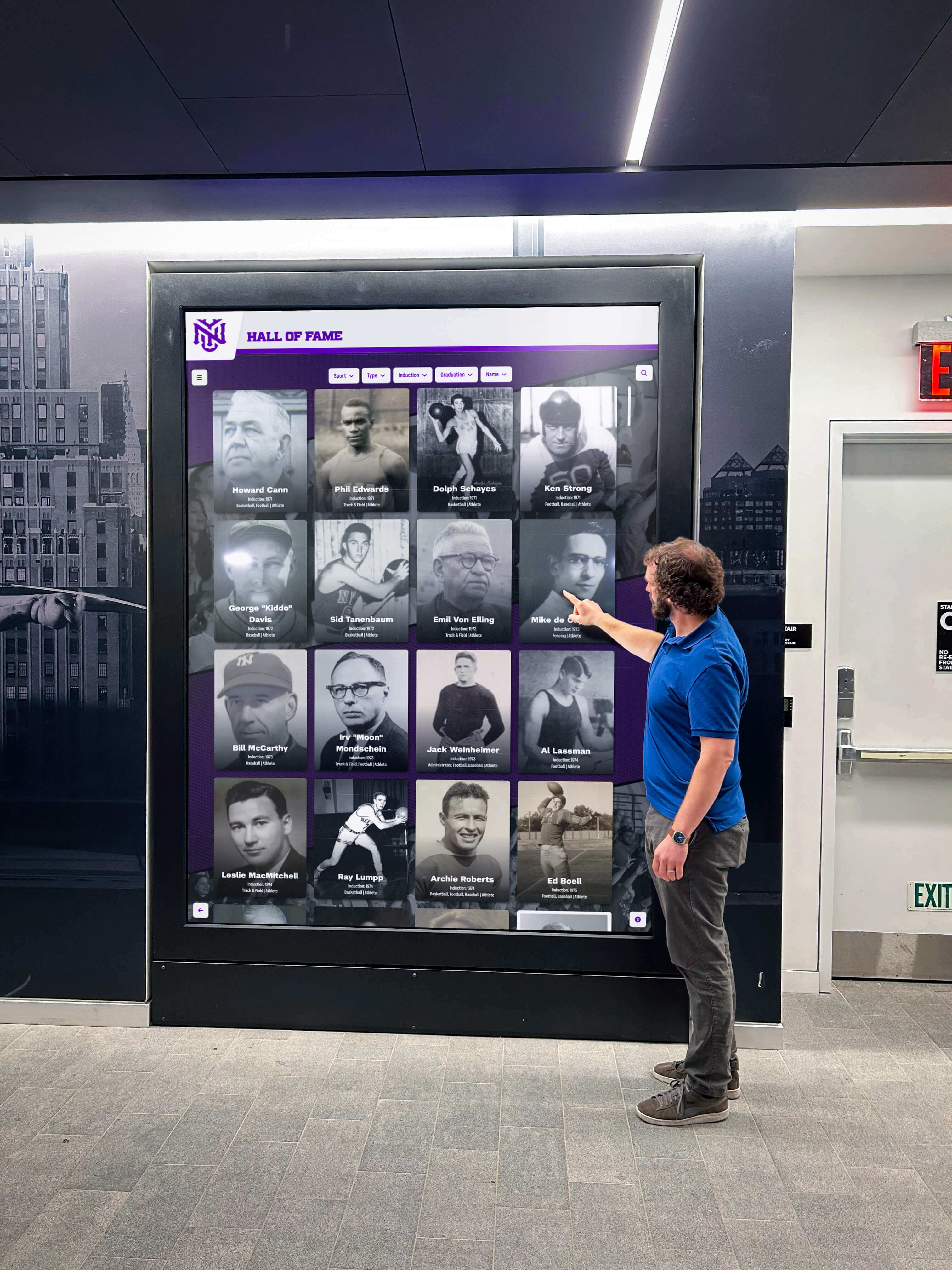 Person using interactive donor recognition touchscreen